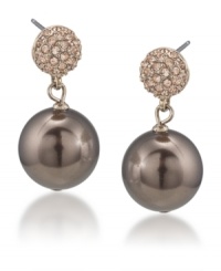 Twice as nice. Carolee's elegant double drop earrings feature luminous glass pearls and sparkling post details. Crafted in gold tone mixed metal, they're suitably stylish for daytime or evening. Approximate drop: 1 inch. Twice as nice. Carolee's elegant double drop earrings feature luminous glass pearls and sparkling post details. Crafted in gold tone mixed metal, they're suitably stylish for daytime or evening. Approximate drop: 1 inch.
