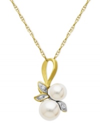 A natural choice. This pendant, crafted from 10k gold, exudes elegance with cultured freshwater pearls (5-6 mm) and diamond accents along a whimsical leaf motif. Approximate length: 18 inches. Approximate drop length: 3/4 inch. Approximate drop width: 1/3 inch.