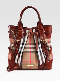 Luxurious smooth leather accents this check printed denim style with pleated and buckled strap details.Double top handles, 7 dropDetachable adjustable shoulder strap, 21-24 dropMagnetic snap closureOne inside zip pocketThree inside open pocketsCotton lining14W X 14H X 5½DMade in Italy Luxurious smooth leather accents this check printed denim style with pleated and buckled strap details.Double top handles, 7 dropDetachable adjustable shoulder strap, 21-24 dropMagnetic snap closureOne inside zip pocketThree inside open pocketsCotton lining14W X 14H X 5½DMade in Italy