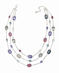 The perfect palette. This layered Swarovski necklace presents three rows of crystals on silver tone mixed metal chains. Crystals sparkle in a stunning gradation of warm pastel colors. Approximate length: 14-7/8 inches. The perfect palette. This layered Swarovski necklace presents three rows of crystals on silver tone mixed metal chains. Crystals sparkle in a stunning gradation of warm pastel colors. Approximate length: 14-7/8 inches.