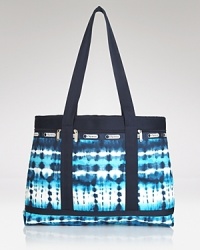 LeSportsac's signature nylon is ready for travels, featuring a durable design, plenty of pockets and a cute print. Carry it on, or simply carry it around town. LeSportsac's signature nylon is ready for travels, featuring a durable design, plenty of pockets and a cute print. Carry it on, or simply carry it around town.
