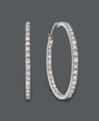 Glam it up girl! These large hoop earrings by B. Brilliant have style and sparkle to boot. Features dozens of round-cut cubic zirconias (1-9/10 ct. t.w.) in a shining, sterling silver setting. Approximate diameter: 3 inches. Glam it up girl! These large hoop earrings by B. Brilliant have style and sparkle to boot. Features dozens of round-cut cubic zirconias (1-9/10 ct. t.w.) in a shining, sterling silver setting. Approximate diameter: 3 inches.
