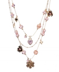 The perfect combination of pink and crystal - fit for a princess. This three-tier illusion necklace by Betsey Johnson features delicate strands decorated with pink crystals and charms. Crafted in gold tone mixed metal. Approximate length: 16 inches + 3-inch extender. Approximate drop: 3/4 inch. The perfect combination of pink and crystal - fit for a princess. This three-tier illusion necklace by Betsey Johnson features delicate strands decorated with pink crystals and charms. Crafted in gold tone mixed metal. Approximate length: 16 inches + 3-inch extender. Approximate drop: 3/4 inch.