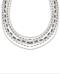 Be a jet-setter. A layered silhouette sets apart this chic multi-chain necklace from 2028. Alluring jet black beads add intrigue. Crafted in silver tone mixed metal. Approximate length: 16 inches + 3-inch extender. Be a jet-setter. A layered silhouette sets apart this chic multi-chain necklace from 2028. Alluring jet black beads add intrigue. Crafted in silver tone mixed metal. Approximate length: 16 inches + 3-inch extender.