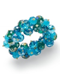 Clusters of summer colors for the season! Slip on c.A.K.e. by Ali Khan's stretchable bracelet, with vibrant turquoise color glass beads. Crafted in gold tone mixed metal. Approximate diameter: 2-1/4 inches. Clusters of summer colors for the season! Slip on c.A.K.e. by Ali Khan's stretchable bracelet, with vibrant turquoise color glass beads. Crafted in gold tone mixed metal. Approximate diameter: 2-1/4 inches.