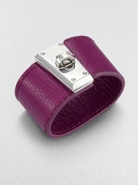 A wide cuff of rich pebble-textured leather is boldly fastened with a polished turn-lock clasp in this simple yet striking design.LeatherRhodium and palladium finishLength, about 8.25Width, about 1.5Turn-lock claspImported A wide cuff of rich pebble-textured leather is boldly fastened with a polished turn-lock clasp in this simple yet striking design.LeatherRhodium and palladium finishLength, about 8.25Width, about 1.5Turn-lock claspImported