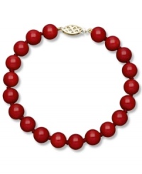 Crimson chic. This stunning strand bracelet features bold red agate (80 ct. t.w.) in a polished 14k gold setting. Approximate drop: 7-1/2 inches. Approximate bead diameter: 8 mm. Crimson chic. This stunning strand bracelet features bold red agate (80 ct. t.w.) in a polished 14k gold setting. Approximate drop: 7-1/2 inches. Approximate bead diameter: 8 mm.