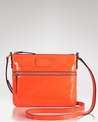 Compact style gets glossy with this coated leather crossbody bag from kate spade new york. Sized to slip across the body, this bag is a small way to add major shine. Compact style gets glossy with this coated leather crossbody bag from kate spade new york. Sized to slip across the body, this bag is a small way to add major shine.