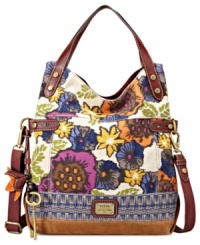Every look needs a little laid-back luxe and this take-anywhere tote from Fossil is the perfect choice. Rich Italian leather and classic brass-tone hardware accentuate the colorful floral canvas, while plenty of pockets organize the interior. Every look needs a little laid-back luxe and this take-anywhere tote from Fossil is the perfect choice. Rich Italian leather and classic brass-tone hardware accentuate the colorful floral canvas, while plenty of pockets organize the interior.