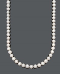 Enrich your wardrobe with a luxurious strand of pearls. This polished Belle de Mer necklace features AA+ cultured freshwater pearls (11-12 mm) with a 14k gold clasp. Approximate length: 24 inches. Enrich your wardrobe with a luxurious strand of pearls. This polished Belle de Mer necklace features AA+ cultured freshwater pearls (11-12 mm) with a 14k gold clasp. Approximate length: 24 inches.