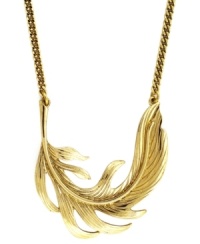 Blowin' in the wind. BCBGeneration's ultra-trendy leaf pendant is set on its side for a funky asymmetrical look. Crafted in gold tone mixed metal. Approximate length: 17 inches. Approximate drop: 2 inches. Blowin' in the wind. BCBGeneration's ultra-trendy leaf pendant is set on its side for a funky asymmetrical look. Crafted in gold tone mixed metal. Approximate length: 17 inches. Approximate drop: 2 inches.