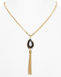 Inject some serious edge into your jewel box with pendant necklace from T Tahari. This statement piece boasts a faceted black crystal stone, coolly framed in gold plated chain links. Inject some serious edge into your jewel box with pendant necklace from T Tahari. This statement piece boasts a faceted black crystal stone, coolly framed in gold plated chain links.