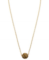 Where there's smoky style, there's red-hot fashion. Anne Klein's pendant necklace radiates heat with a fireball embellished with topaz crystals. Crafted in gold tone mixed metal. Approximate length: 16 inches + 2-inch extender. Where there's smoky style, there's red-hot fashion. Anne Klein's pendant necklace radiates heat with a fireball embellished with topaz crystals. Crafted in gold tone mixed metal. Approximate length: 16 inches + 2-inch extender.