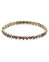 Twinkling amethyst colored stones orbit around this MARC BY MARC JACOBS bangle - making this piece oh-so spot on.