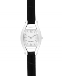 Go back to basics with this classic design, by Nine West. Crafted of textured black leather strap and cushion-shaped silver tone mixed metal case. Silver tone dial with swirling design features silver tone applied stick indices, numerals at twelve and six o'clock, silver tone hour and minute hands, sweeping second hand and logo at six o'clock. Quartz movement. Limited lifetime warranty. Go back to basics with this classic design, by Nine West. Crafted of textured black leather strap and cushion-shaped silver tone mixed metal case. Silver tone dial with swirling design features silver tone applied stick indices, numerals at twelve and six o'clock, silver tone hour and minute hands, sweeping second hand and logo at six o'clock. Quartz movement. Limited lifetime warranty.