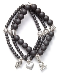 Layers of hematite beads and silver charms on Good Charma's bracelets are in perfect step with this season's global influences. Make this set your exotic embellishment of choice. Layers of hematite beads and silver charms on Good Charma's bracelets are in perfect step with this season's global influences. Make this set your exotic embellishment of choice.