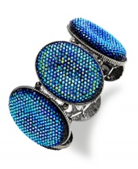 Playful color can turn your day around. This colorful Style&co. bracelet features a linked silhouette set with oval-cut blue plastic stones with a glitter finish. Crafted in hematite tone mixed metal. Approximate length: 7-1/2 inches. Stretches to fit wrist. Playful color can turn your day around. This colorful Style&co. bracelet features a linked silhouette set with oval-cut blue plastic stones with a glitter finish. Crafted in hematite tone mixed metal. Approximate length: 7-1/2 inches. Stretches to fit wrist.