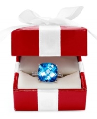 Stunning sparkle that turns heads. This exquisite ring features cushion-cut blue topaz (7-3/4 ct. t.w.) and round-cut diamond accents set in 14k white gold. Stunning sparkle that turns heads. This exquisite ring features cushion-cut blue topaz (7-3/4 ct. t.w.) and round-cut diamond accents set in 14k white gold.