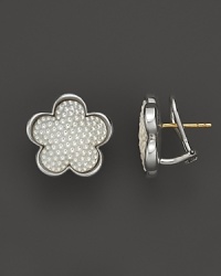 Beaded mother-of-pearl and sterling silver floral stud earrings from Lagos. Beaded mother-of-pearl and sterling silver floral stud earrings from Lagos.