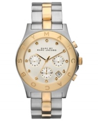 Golden accents catch the eye on this classic steel watch from Marc by Marc Jacobs. Golden accents catch the eye on this classic steel watch from Marc by Marc Jacobs.