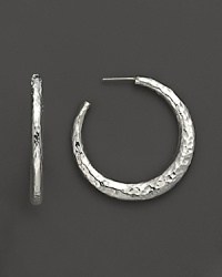 Striking sterling silver hoops, hammered for beautiful texture. Striking sterling silver hoops, hammered for beautiful texture.