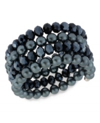 Wrap star. This coil bracelet from Kenneth Cole New York is crafted from silver-tone mixed metal with navy glass pearls and cherry beads making a bold fashion statement. Item comes packaged in a signature Kenneth Cole New York Gift Box. Approximate length: 7-1/2 inches. Approximate width: 1-1/4 inches. Wrap star. This coil bracelet from Kenneth Cole New York is crafted from silver-tone mixed metal with navy glass pearls and cherry beads making a bold fashion statement. Item comes packaged in a signature Kenneth Cole New York Gift Box. Approximate length: 7-1/2 inches. Approximate width: 1-1/4 inches.