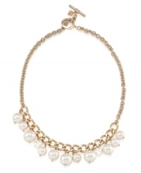 Everlasting elegance. Glass and plastic pearls combine on this classically chic necklace from Carolee. Crafted in antique gold tone mixed metal, it's an attractive addition to your workday wardrobe. Approximate length: 18 inches. Everlasting elegance. Glass and plastic pearls combine on this classically chic necklace from Carolee. Crafted in antique gold tone mixed metal, it's an attractive addition to your workday wardrobe. Approximate length: 18 inches.