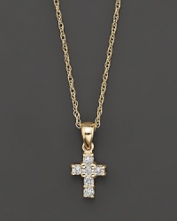 A heavenly diamond cross pendant in 14 Kt. yellow gold, with rope chain. A heavenly diamond cross pendant in 14 Kt. yellow gold, with rope chain.