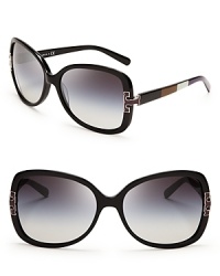 Steal the fashion show in these dark, oversized Tory Burch sunglasses, punched up with trendy colorblocked sides and bold logo accents. Steal the fashion show in these dark, oversized Tory Burch sunglasses, punched up with trendy colorblocked sides and bold logo accents.