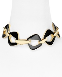 Belle Noel mines '60's inspiration for this large-link plated metal necklace. Crafted of gold tone and enamel it's bold lines evoke all that's slick and cool about pop art style. Belle Noel mines '60's inspiration for this large-link plated metal necklace. Crafted of gold tone and enamel it's bold lines evoke all that's slick and cool about pop art style.
