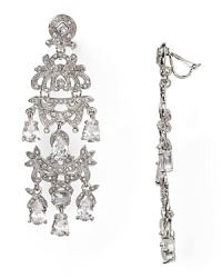 A cascade of specially set crystals illuminate these Carolee earrings which dangle from effortlessly wearable clip-on backs. A cascade of specially set crystals illuminate these Carolee earrings which dangle from effortlessly wearable clip-on backs.