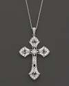 With beautiful filigree detail and diamonds, this cross pendant necklace brings a vintage charm to your look.