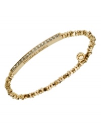 Stackable styles a must! Michael Kors' chic stretch bracelet pairs perfectly with bangles or bracelets. Beads and bar accent are crafted in gold tone mixed metal and accented by pave-set glass accents. Approximate diameter: 2-1/4 inches. Approximate width: 1/8 inch. Stackable styles a must! Michael Kors' chic stretch bracelet pairs perfectly with bangles or bracelets. Beads and bar accent are crafted in gold tone mixed metal and accented by pave-set glass accents. Approximate diameter: 2-1/4 inches. Approximate width: 1/8 inch.