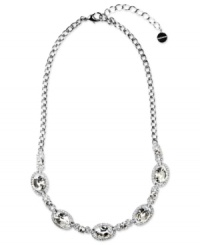 Start with sparkling sophistication. Givenchy's chic collar necklace features Swarovski crystal stone pendants. Crafted in imitation rhodium plated mixed metal. Approximate length: 16 inches + 2-inch extender. Start with sparkling sophistication. Givenchy's chic collar necklace features Swarovski crystal stone pendants. Crafted in imitation rhodium plated mixed metal. Approximate length: 16 inches + 2-inch extender.