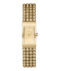 Tell time with rows of shine, thanks to this brilliant DKNY watch. Bracelet crafted from four rows of crystal set in goldtone stainless steel and rectangular case. Champagne dial features goldtone hands, stick indices and logo. Quartz movement. Water resistant to 50 meters. Two-year limited warranty. Tell time with rows of shine, thanks to this brilliant DKNY watch. Bracelet crafted from four rows of crystal set in goldtone stainless steel and rectangular case. Champagne dial features goldtone hands, stick indices and logo. Quartz movement. Water resistant to 50 meters. Two-year limited warranty.