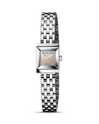A sleek minimalist design from Gucci's G-Frame collection, this analog watch features a succinct square face with brown mirror dial. A sleek minimalist design from Gucci's G-Frame collection, this analog watch features a succinct square face with brown mirror dial.