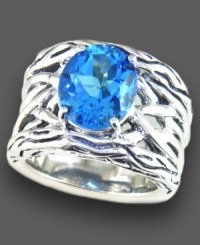 Eye-catching oval-cut blue topaz (5-3/4 ct. t.w.) sits atop a woven sterling silver setting on this beautiful Balissima by Effy Collection ring. Size 7.