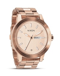 Be fashionably on time. With chunky-chic gold bracelet, Nixon's classically styled chronograph makes a handsome complement to this season's boy-borrowed looks. Be fashionably on time. With chunky-chic gold bracelet, Nixon's classically styled chronograph makes a handsome complement to this season's boy-borrowed looks.