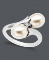 Wrap yourself in ultimate elegance. A clever wrap ring features two smooth cultured freshwater pearls (7-9 mm) at the ends. Crafted in sterling silver. Size 7.