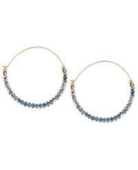 Tiny beads make a big statement on this pair of hoop earrings from Kenneth Cole New York. The silver and blue cherry beads adorn the earrings crafted from gold-tone mixed metal for a stunning look. Approximate drop: 2-1/4 inches. Tiny beads make a big statement on this pair of hoop earrings from Kenneth Cole New York. The silver and blue cherry beads adorn the earrings crafted from gold-tone mixed metal for a stunning look. Approximate drop: 2-1/4 inches.