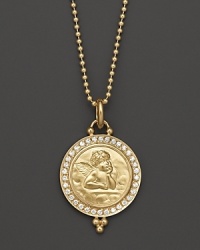 18K yellow gold medallion, surrounded by diamond pavé and etched with a thoughtful angel. By Temple St. Clair. 18K yellow gold medallion, surrounded by diamond pavé and etched with a thoughtful angel. By Temple St. Clair.