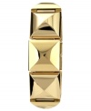 Go undercover with this pyramid-stud watch from Vince Camuto. Features a bangle bracelet-inspired design with a covered dial.