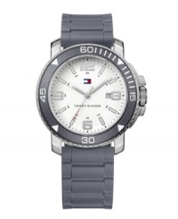 Keep your cool with this ultra-stylish and monochromatic sport watch by Tommy Hilfiger. Gray silicone strap and round silver tone mixed metal case with gray bezel. White dial features applied silver tone numerals at twelve, three, six and nine o'clock, stick indices, date window at three o'clock, three hands and logo. Quartz movement. Water resistant to 30 meters. Ten-year limited warranty. Keep your cool with this ultra-stylish and monochromatic sport watch by Tommy Hilfiger. Gray silicone strap and round silver tone mixed metal case with gray bezel. White dial features applied silver tone numerals at twelve, three, six and nine o'clock, stick indices, date window at three o'clock, three hands and logo. Quartz movement. Water resistant to 30 meters. Ten-year limited warranty.