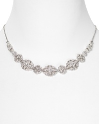 With a delicate crystal-encrusted garland, Nadri's glimmering silver necklace is a beautiful adornment. Wear it to exude elegance. With a delicate crystal-encrusted garland, Nadri's glimmering silver necklace is a beautiful adornment. Wear it to exude elegance.