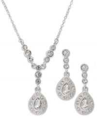 Teardrop silhouettes are cheered up with shimmering crystal accents on Charter Club's necklace and earring set. Crafted in silver tone mixed metal. Approximate length (necklace): 14 inches + 2-inch extender. Approximate drop (both): 1-3/4 inches. Teardrop silhouettes are cheered up with shimmering crystal accents on Charter Club's necklace and earring set. Crafted in silver tone mixed metal. Approximate length (necklace): 14 inches + 2-inch extender. Approximate drop (both): 1-3/4 inches.