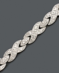 Show your love with glittering kisses and hugs by Victoria Townsend. Sterling silver links shaped like X's and O's sparkle with brilliant round-cut diamonds (1/4 ct. t.w.). Approximate length: 7 inches. Show your love with glittering kisses and hugs by Victoria Townsend. Sterling silver links shaped like X's and O's sparkle with brilliant round-cut diamonds (1/4 ct. t.w.). Approximate length: 7 inches.
