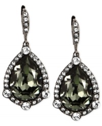 A proper mix of subtle and bold. Givenchy's drop earrings, crafted from hematite-tone mixed metal, feature a dark glass crystal stone in the center offset by lustrous accents. Approximate drop: 4 inches. A proper mix of subtle and bold. Givenchy's drop earrings, crafted from hematite-tone mixed metal, feature a dark glass crystal stone in the center offset by lustrous accents. Approximate drop: 4 inches.