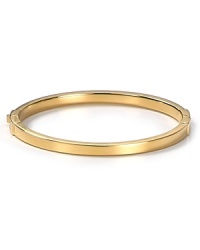 Keep it simple: MICHAEL Michael Kors' gilded bangle perfects refined polish at your wrist. Worn solo or stacked, the slim bracelet shines on for perennial chic. Keep it simple: MICHAEL Michael Kors' gilded bangle perfects refined polish at your wrist. Worn solo or stacked, the slim bracelet shines on for perennial chic.