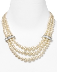 Vow to wow on your big day with this triple strand graduated pearl necklace. It's a demure statement piece for the bride-to-be with classic aisle style. Vow to wow on your big day with this triple strand graduated pearl necklace. It's a demure statement piece for the bride-to-be with classic aisle style.