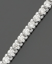 Elevated elegance. This stunning diamond bracelet features round-cut certified diamonds (7 ct. t.w.) set in luminous 14k white gold. 7 carat diamond bracelet approximate length: 7-1/4 inches. Elevated elegance. This stunning diamond bracelet features round-cut certified diamonds (7 ct. t.w.) set in luminous 14k white gold. 7 carat diamond bracelet approximate length: 7-1/4 inches.